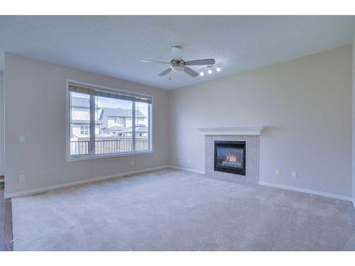 446 Sherwood Place Nw, Calgary, AB - Indoor Photo Showing Living Room With Fireplace