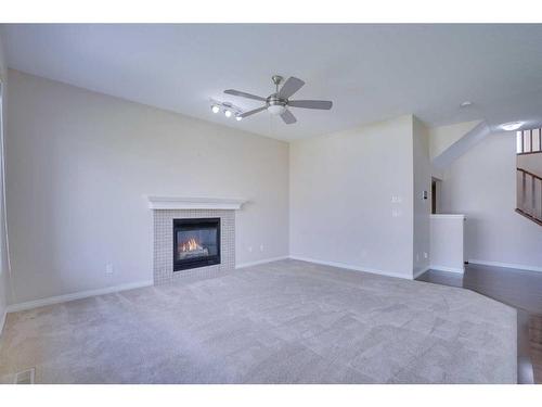 446 Sherwood Place Nw, Calgary, AB - Indoor Photo Showing Living Room With Fireplace