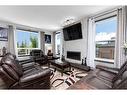 53 Legacy Gate Se, Calgary, AB  - Indoor Photo Showing Living Room With Fireplace 