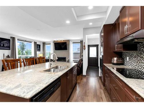 53 Legacy Gate Se, Calgary, AB - Indoor Photo Showing Kitchen With Double Sink With Upgraded Kitchen