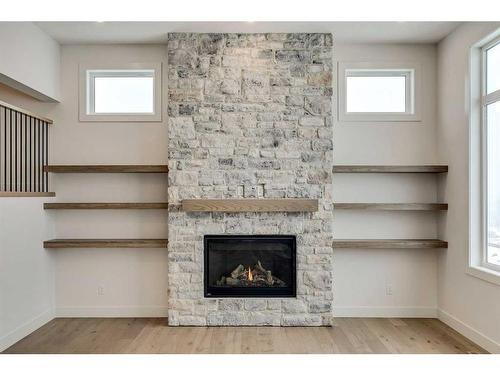 92 Cimarron Estates Drive, Okotoks, AB - Indoor Photo Showing Living Room With Fireplace