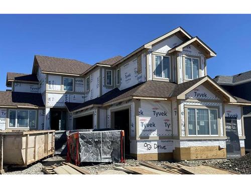 92 Cimarron Estates Drive, Okotoks, AB - Outdoor With Facade