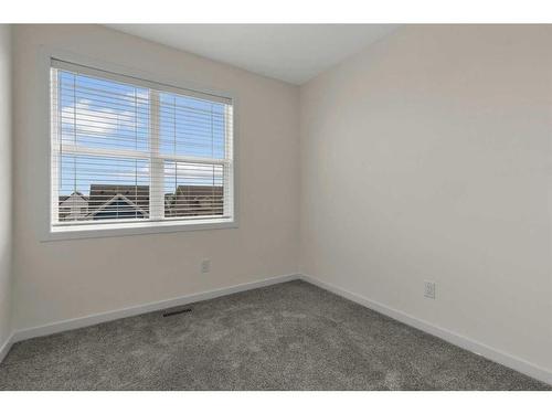 158 Copperleaf Way Se, Calgary, AB - Indoor Photo Showing Other Room