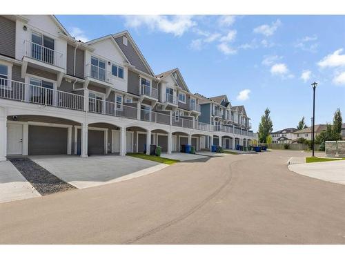 158 Copperleaf Way Se, Calgary, AB - Outdoor With Balcony With Facade