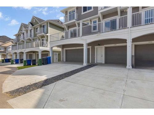 158 Copperleaf Way Se, Calgary, AB - Outdoor With Balcony With Facade