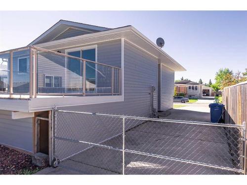 205-200 Southridge Place, Didsbury, AB - Outdoor With Exterior