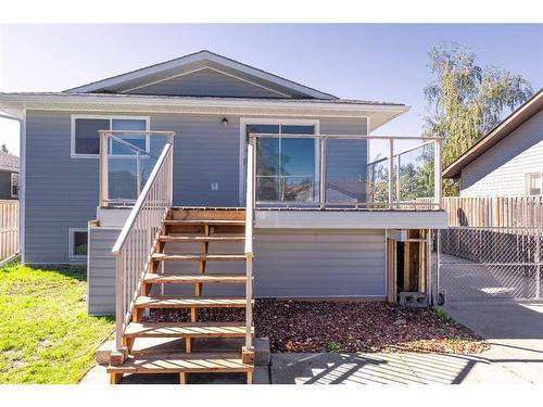 205-200 Southridge Place, Didsbury, AB - Outdoor With Deck Patio Veranda With Exterior