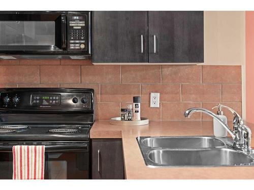 708-1410 1 Street Se, Calgary, AB - Indoor Photo Showing Kitchen With Double Sink