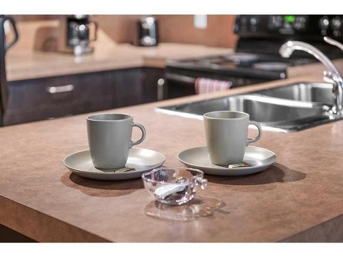 708-1410 1 Street Se, Calgary, AB - Indoor Photo Showing Kitchen With Double Sink