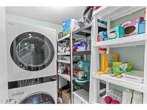 308-2218 30 Street Sw, Calgary, AB - Indoor Photo Showing Laundry Room