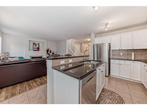 161 Silverado Range View, Calgary, AB - Indoor Photo Showing Kitchen With Double Sink