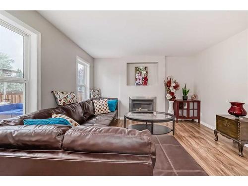 161 Silverado Range View, Calgary, AB - Indoor Photo Showing Living Room With Fireplace