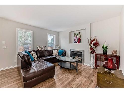 161 Silverado Range View, Calgary, AB - Indoor Photo Showing Living Room With Fireplace