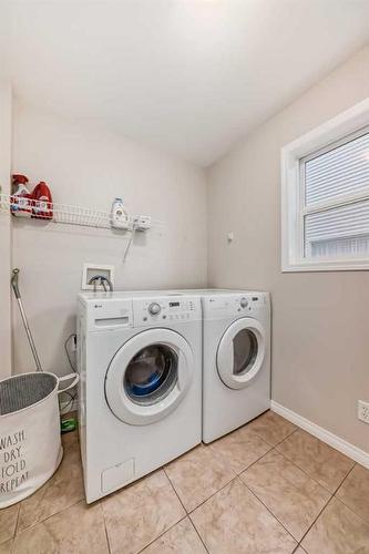 161 Silverado Range View, Calgary, AB - Indoor Photo Showing Laundry Room