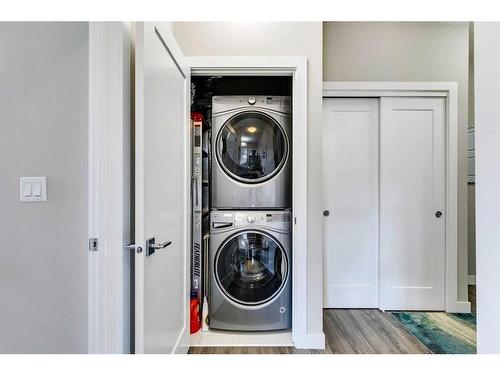 408-150 Auburn Meadows Manor Se, Calgary, AB - Indoor Photo Showing Laundry Room