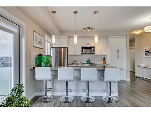 408-150 Auburn Meadows Manor Se, Calgary, AB - Indoor Photo Showing Kitchen With Stainless Steel Kitchen With Upgraded Kitchen