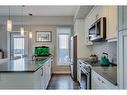 408-150 Auburn Meadows Manor Se, Calgary, AB  - Indoor Photo Showing Kitchen With Double Sink With Upgraded Kitchen 