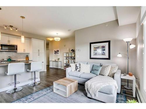 408-150 Auburn Meadows Manor Se, Calgary, AB - Indoor Photo Showing Living Room