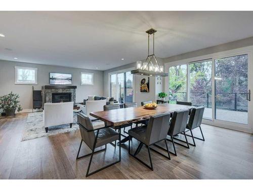 1920 10A Street Sw, Calgary, AB - Indoor Photo Showing Dining Room With Fireplace