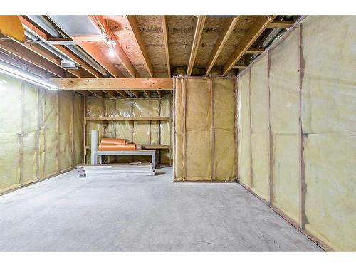 94 Rivercrest Villas Se, Calgary, AB - Indoor Photo Showing Basement