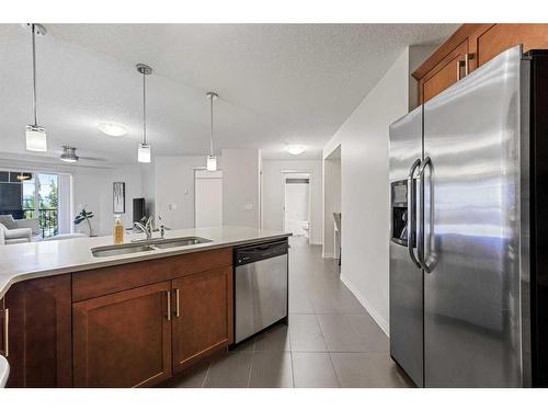 2212-175 Panatella Hill Nw, Calgary, AB - Indoor Photo Showing Kitchen With Double Sink With Upgraded Kitchen