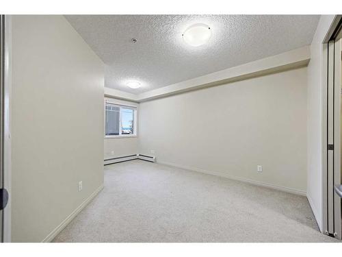 2212-175 Panatella Hill Nw, Calgary, AB - Indoor Photo Showing Other Room