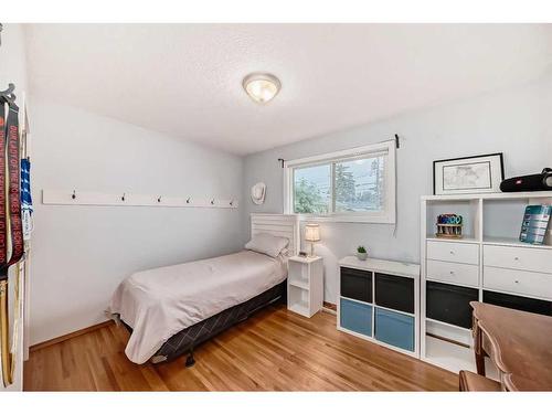 9216 Allison Drive Se, Calgary, AB - Indoor Photo Showing Bedroom