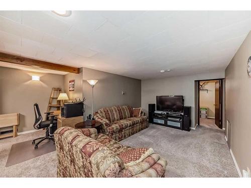 9216 Allison Drive Se, Calgary, AB - Indoor Photo Showing Living Room