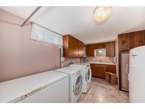 9216 Allison Drive Se, Calgary, AB - Indoor Photo Showing Laundry Room