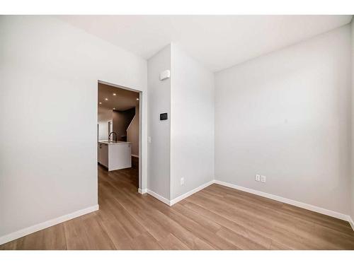 128 Edith Place Nw, Calgary, AB - Indoor Photo Showing Other Room