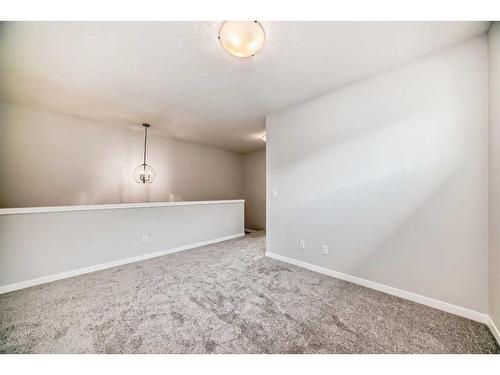 128 Edith Place Nw, Calgary, AB - Indoor Photo Showing Other Room