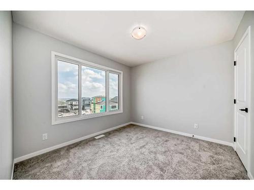 128 Edith Place Nw, Calgary, AB - Indoor Photo Showing Other Room