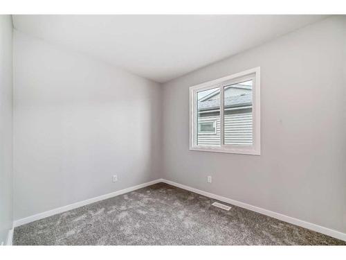 128 Edith Place Nw, Calgary, AB - Indoor Photo Showing Other Room