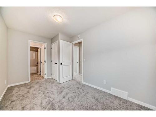 128 Edith Place Nw, Calgary, AB - Indoor Photo Showing Other Room