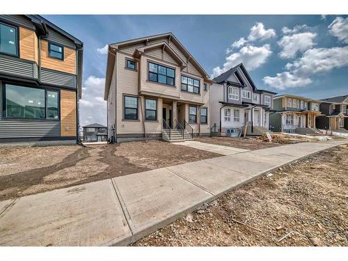 128 Edith Place Nw, Calgary, AB - Outdoor With Facade