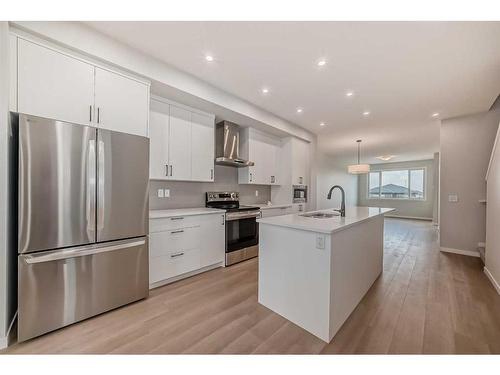 128 Edith Place Nw, Calgary, AB - Indoor Photo Showing Kitchen With Upgraded Kitchen