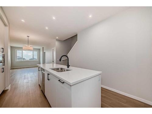 128 Edith Place Nw, Calgary, AB - Indoor Photo Showing Kitchen With Double Sink