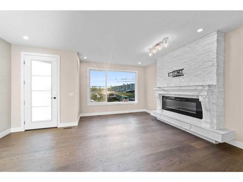 5222 21 Street Sw, Calgary, AB - Indoor Photo Showing Living Room With Fireplace