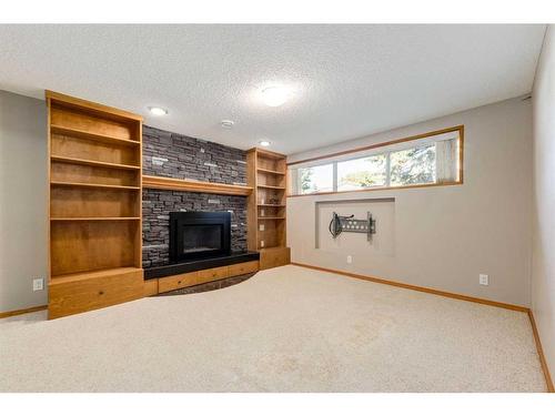 1320 56 Avenue Nw, Calgary, AB - Indoor With Fireplace