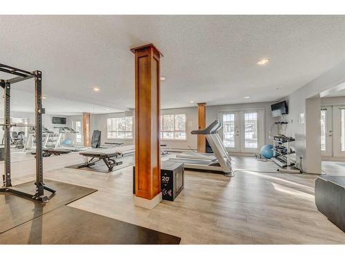 254-35 Richard Court Sw, Calgary, AB - Indoor Photo Showing Gym Room