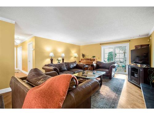 240 Wood Valley Drive Sw, Calgary, AB - Indoor Photo Showing Living Room