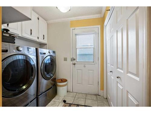 240 Wood Valley Drive Sw, Calgary, AB - Indoor Photo Showing Laundry Room