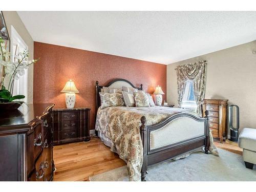 240 Wood Valley Drive Sw, Calgary, AB - Indoor Photo Showing Bedroom