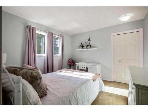 240 Wood Valley Drive Sw, Calgary, AB - Indoor Photo Showing Bedroom