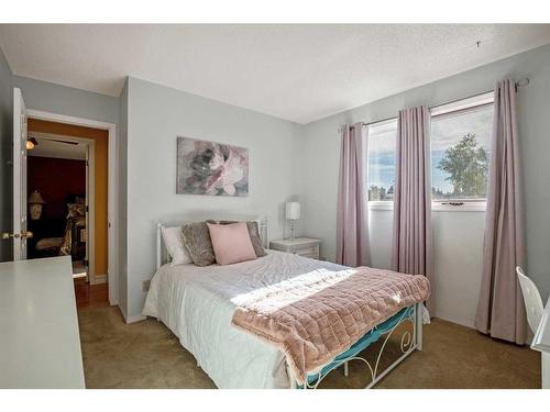 240 Wood Valley Drive Sw, Calgary, AB - Indoor Photo Showing Bedroom