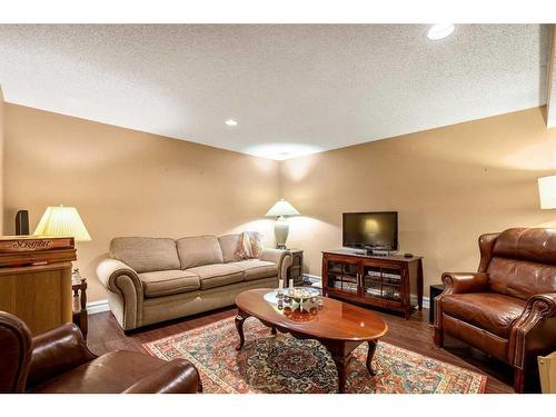 240 Wood Valley Drive Sw, Calgary, AB - Indoor Photo Showing Living Room