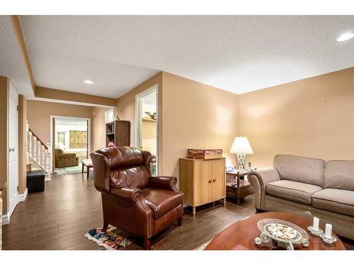 240 Wood Valley Drive Sw, Calgary, AB - Indoor Photo Showing Living Room