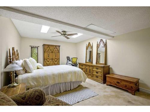 240 Wood Valley Drive Sw, Calgary, AB - Indoor Photo Showing Bedroom