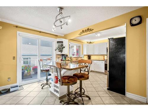 240 Wood Valley Drive Sw, Calgary, AB - Indoor Photo Showing Dining Room