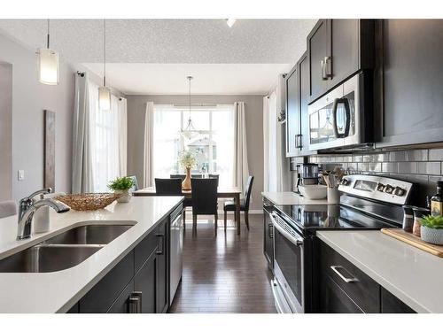 39 Nolanfield Terrace Nw, Calgary, AB - Indoor Photo Showing Kitchen With Double Sink